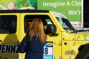 Rebelle Rally Founder Emily Miller talks to drivers on Day One of the Rebelle Rally