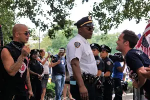 Pro- and anti-Trump protestors draw police attention at anti-ICE raid protests across the city